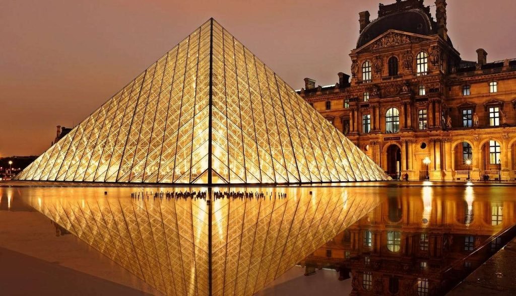 The glass pyramid in front of Louvre Museum in Paris.